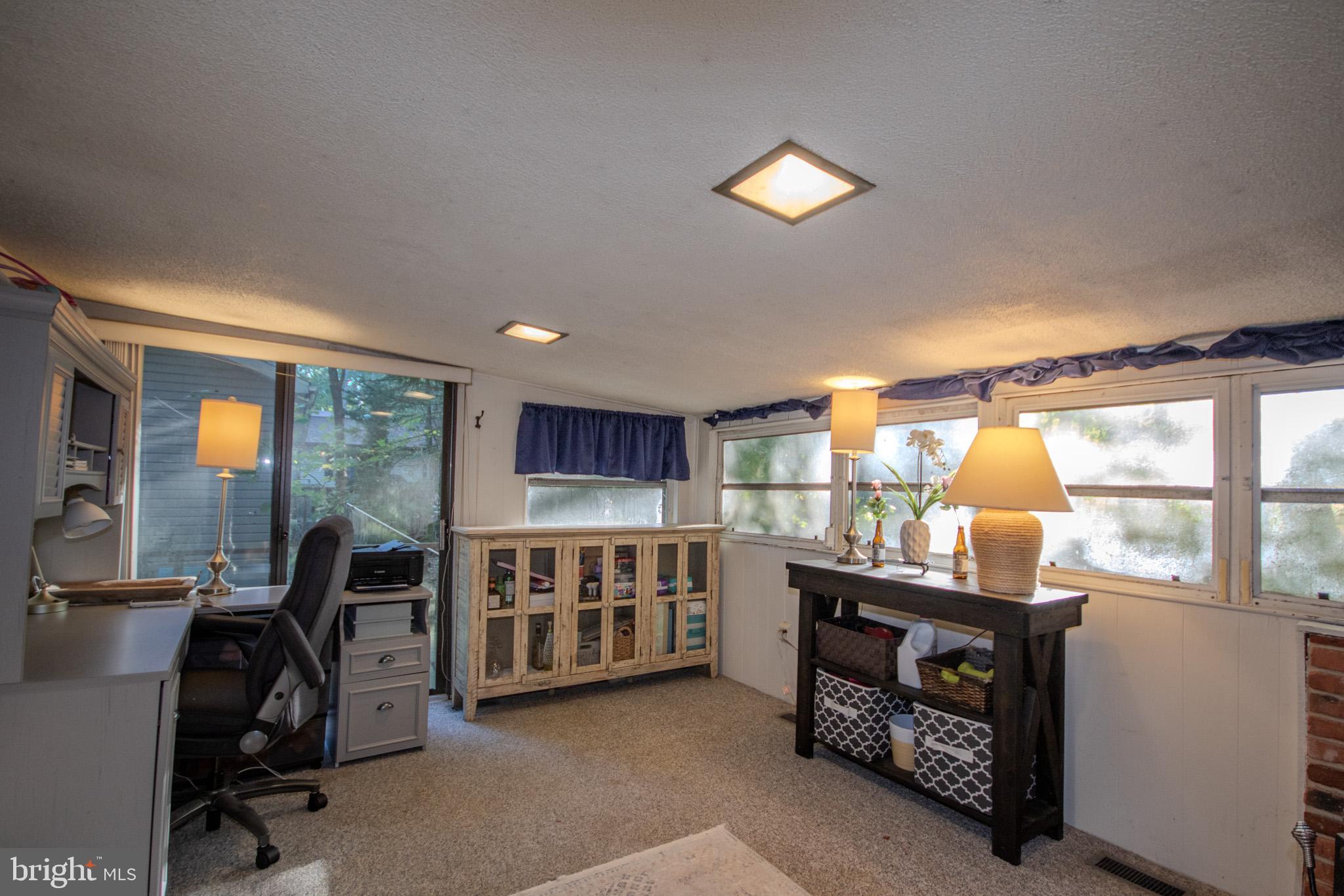 60 Beaconhill Road Ocean Pines, MD 21811 - Photo 12 of 30 a room with furniture and a window