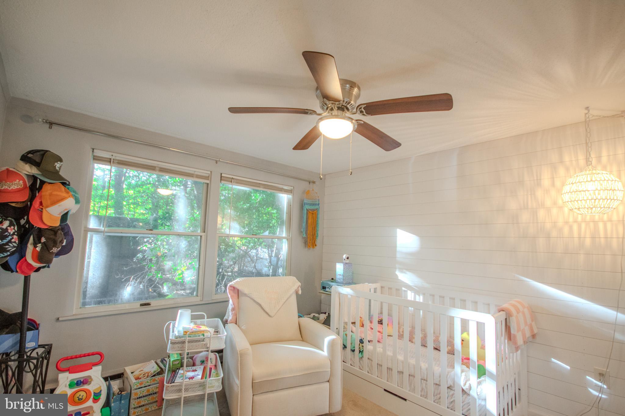 60 Beaconhill Road Ocean Pines, MD 21811 - Photo 20 of 30 a living room with furniture and a large window