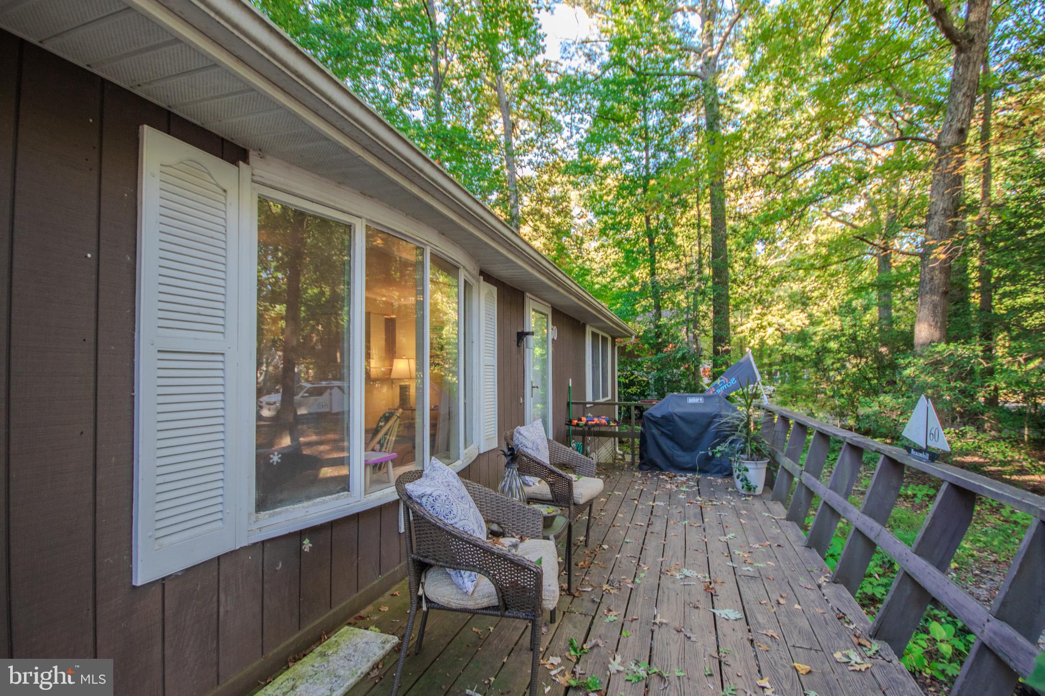 60 Beaconhill Road Ocean Pines, MD 21811 - Photo 4 of 30 a view of balcony with furniture and wooden deck
