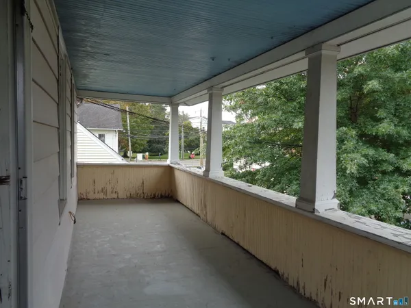 a view of a room with a large window