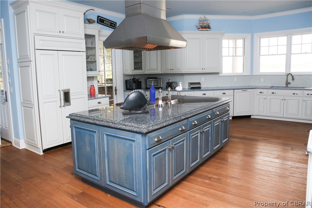 1000 Queenstown Road Lancaster, VA 22503 - Photo 35 of 49 a kitchen with stainless steel appliances granite countertop a sink stove and cabinets