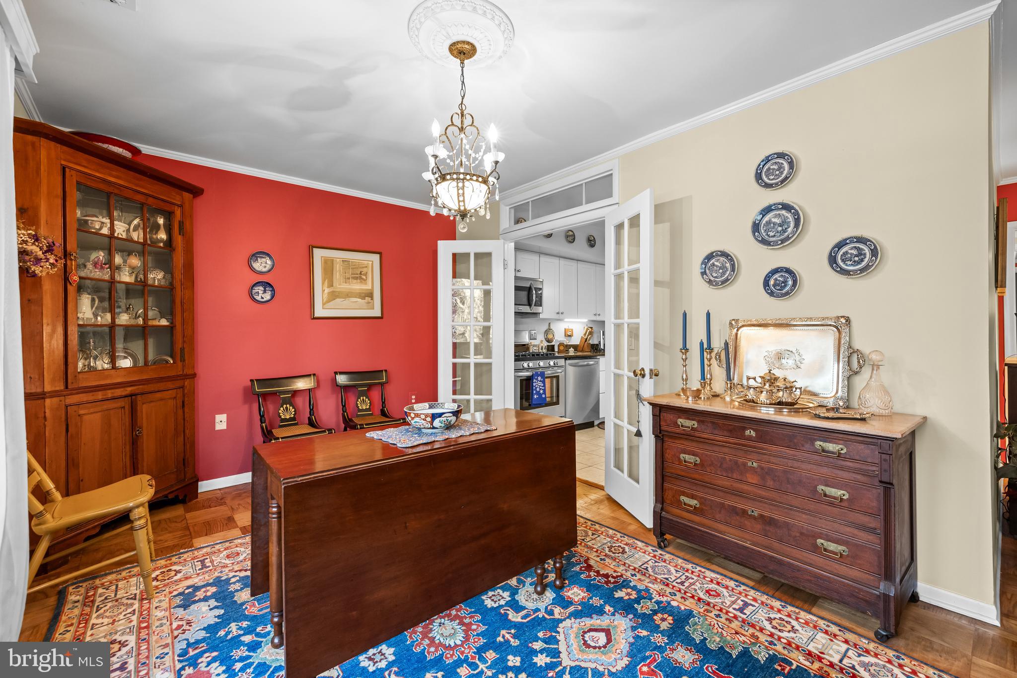 107 Cross Keys Road, Unit R107C Baltimore, MD 21210 - Photo 17 of 40 a living room with furniture and wooden floor