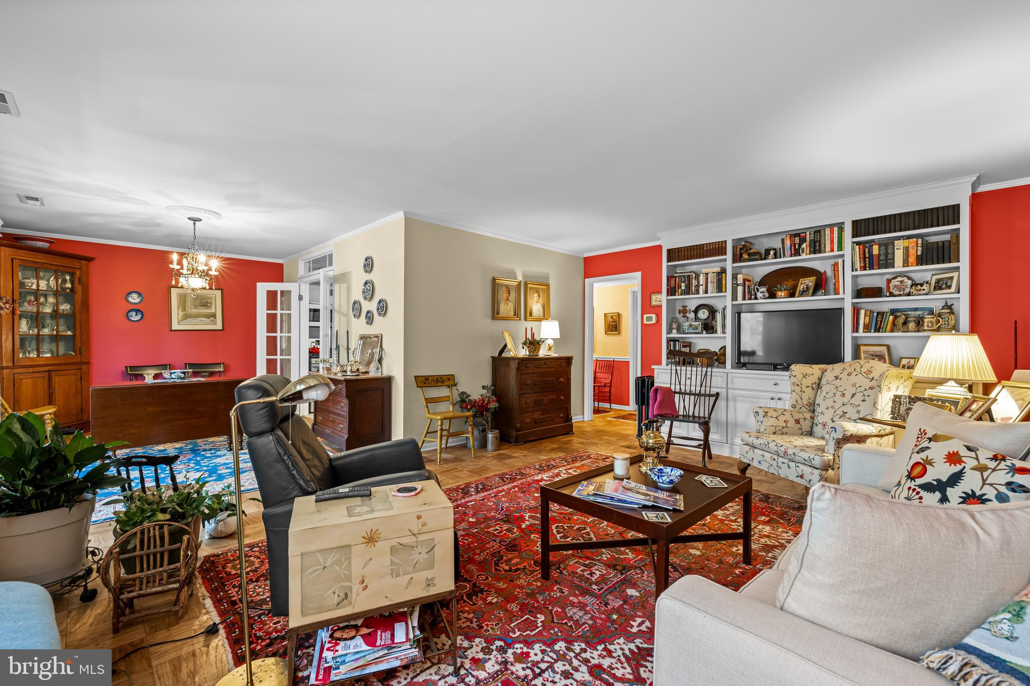 107 Cross Keys Road, Unit R107C Baltimore, MD 21210 - Photo 20 of 40 a living room with furniture and a flat screen tv