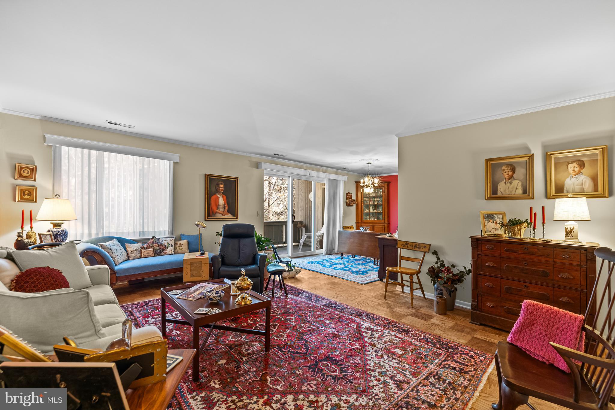 107 Cross Keys Road, Unit R107C Baltimore, MD 21210 - Photo 21 of 40 a living room with furniture a rug and a window