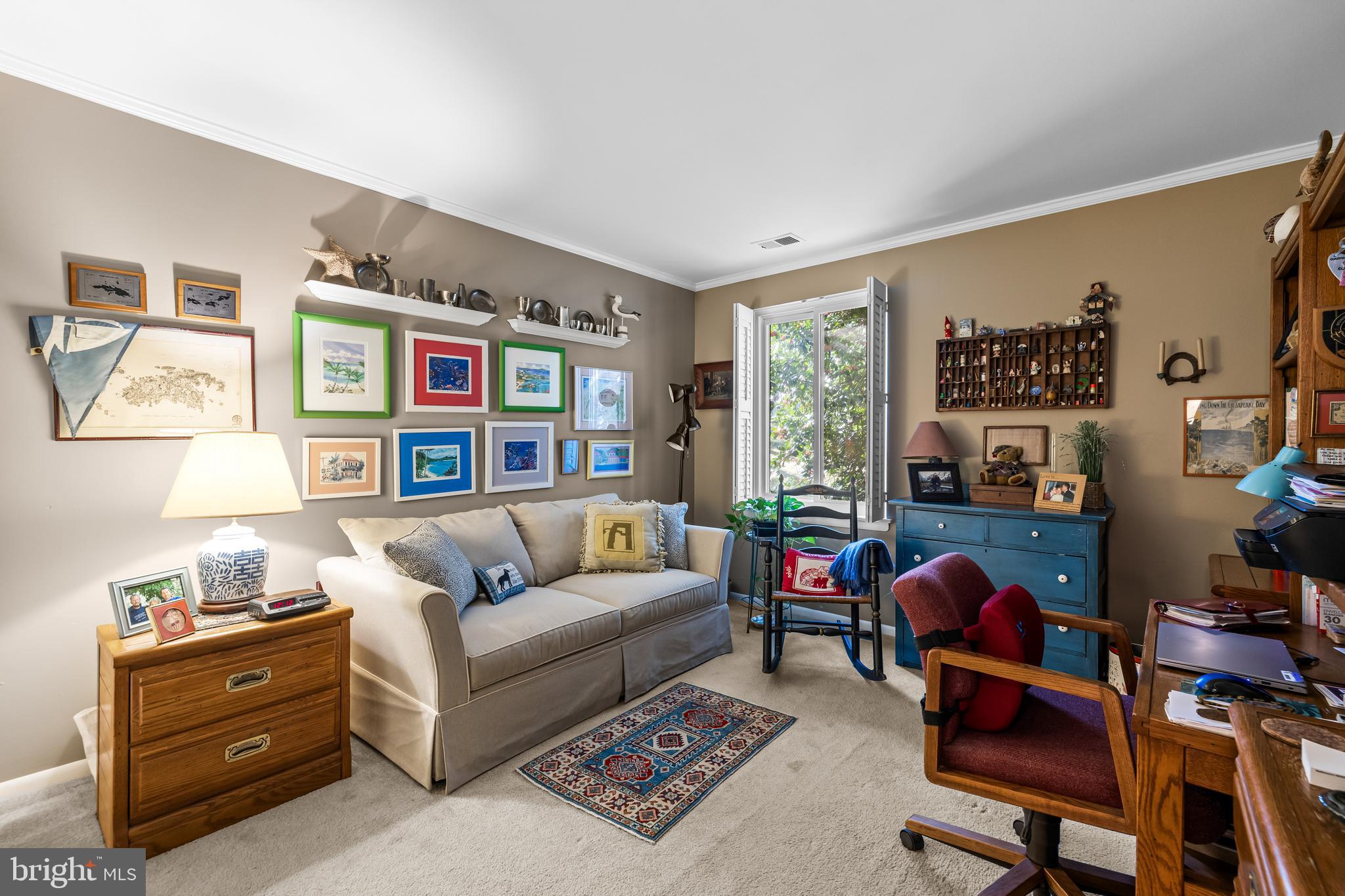 107 Cross Keys Road, Unit R107C Baltimore, MD 21210 - Photo 25 of 40 a living room with furniture workspace and a window