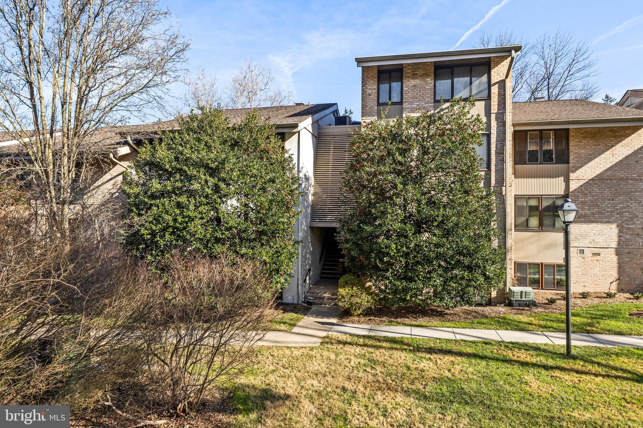 107 Cross Keys Road, Unit R107C Baltimore, MD 21210 - Photo 3 of 40 a view of a house with a yard