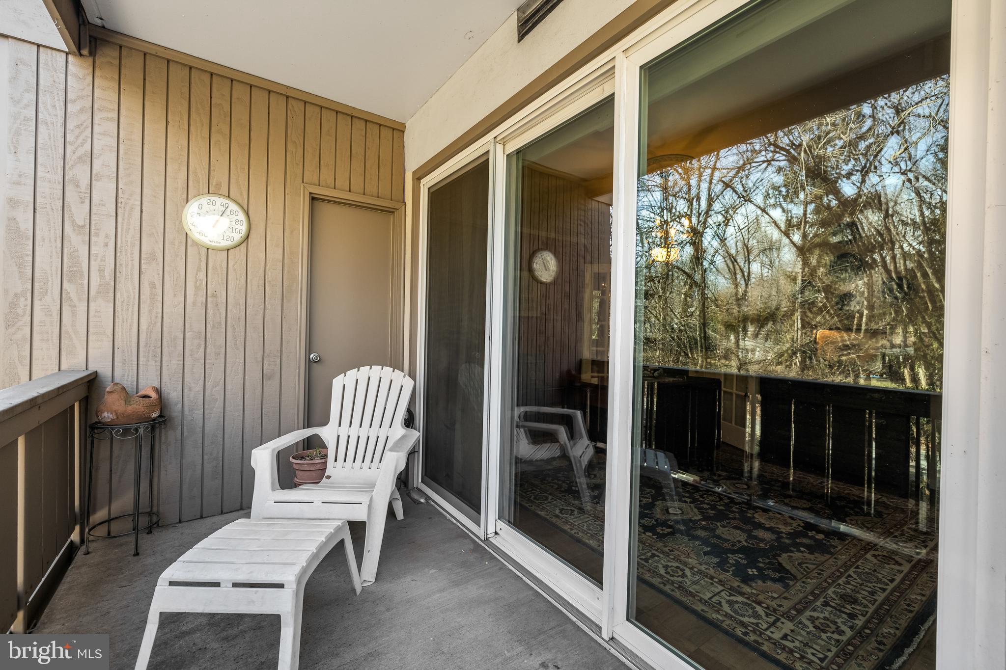 107 Cross Keys Road, Unit R107C Baltimore, MD 21210 - Photo 32 of 40 a view of a balcony with chair