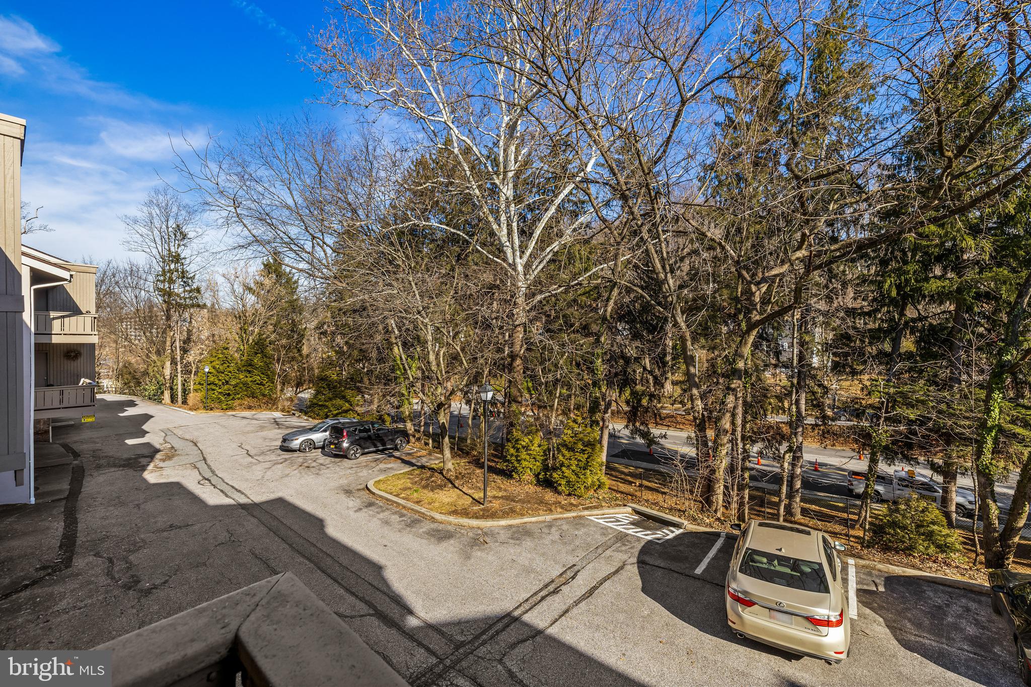 107 Cross Keys Road, Unit R107C Baltimore, MD 21210 - Photo 34 of 40 a view of a patio with a table and chairs and couches