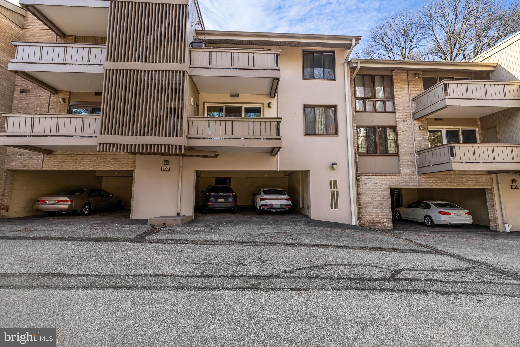 107 Cross Keys Road, Unit R107C Baltimore, MD 21210 - Photo 6 of 40 a car parked in front of a building
