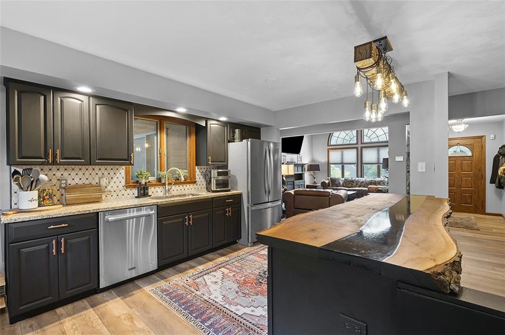 6178 Baker School Road Trafford, PA 15085 - Photo 13 of 48 a large kitchen with lots of counter space and sink