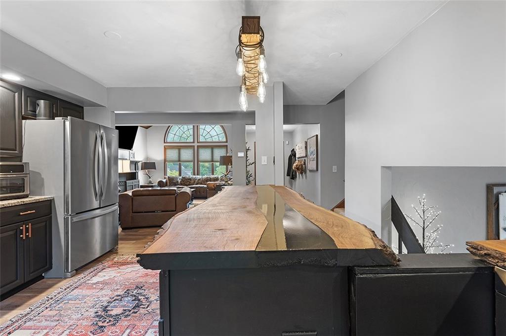 6178 Baker School Road Trafford, PA 15085 - Photo 16 of 48 a kitchen with a refrigerator and a sink