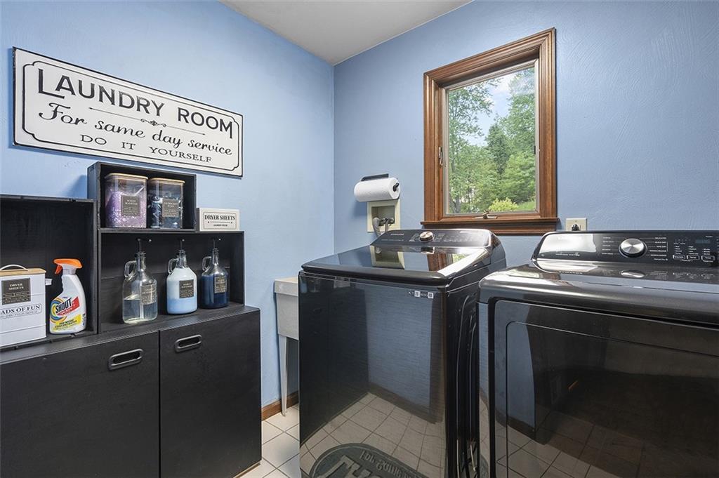 6178 Baker School Road Trafford, PA 15085 - Photo 21 of 48 a kitchen with a sink and cabinets