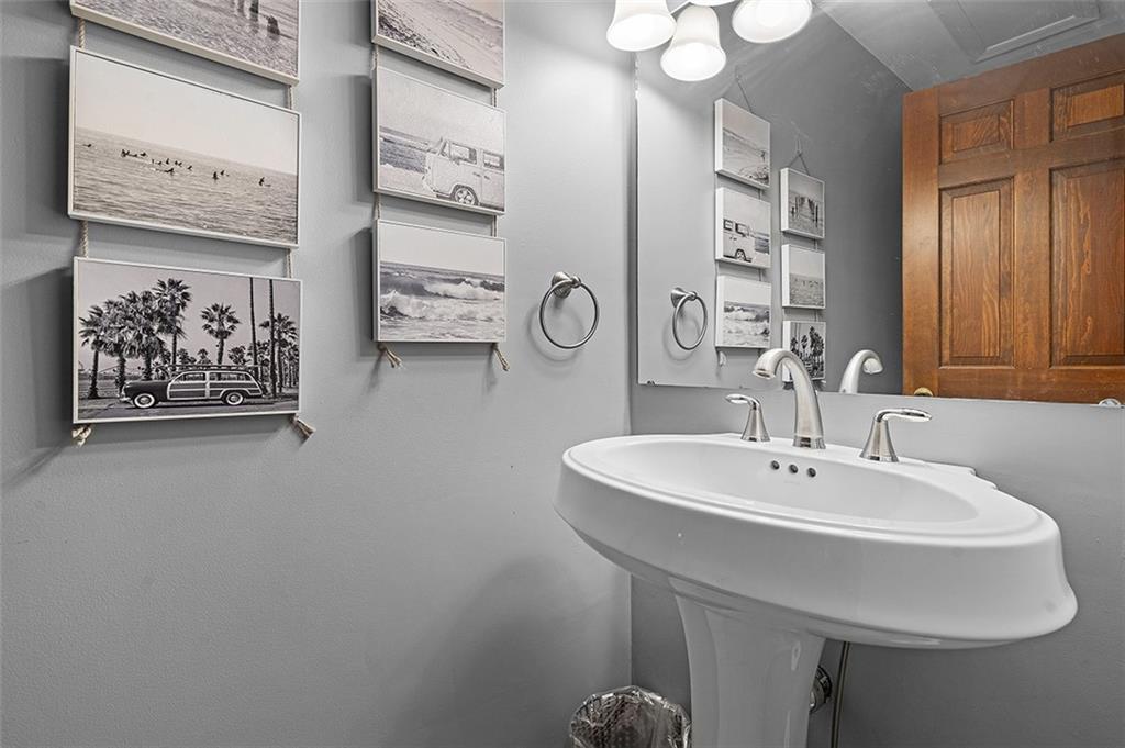 6178 Baker School Road Trafford, PA 15085 - Photo 22 of 48 a bathroom with a sink and a mirror