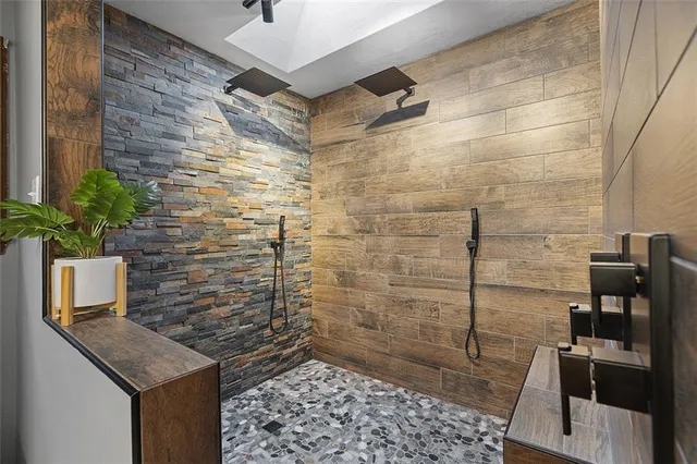 a bathroom with a sink and a shower