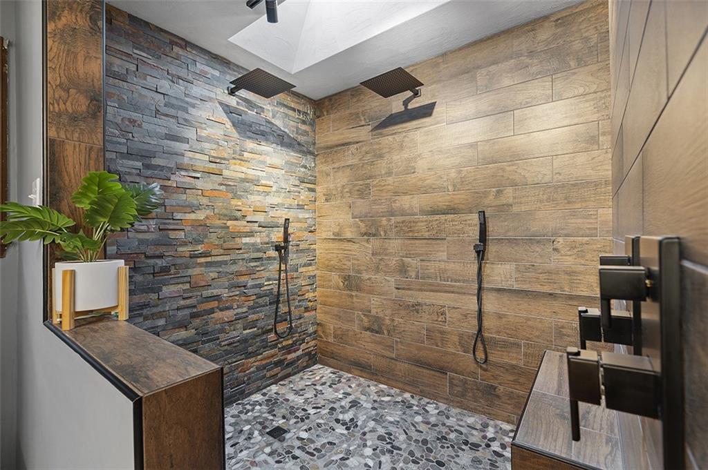 6178 Baker School Road Trafford, PA 15085 - Photo 31 of 48 a bathroom with a sink and a shower