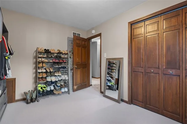 wooden floor and closet in a room