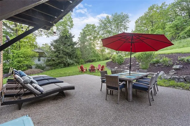 a view of yard with patio