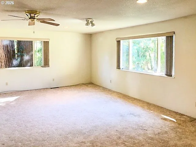 en empty room with windows