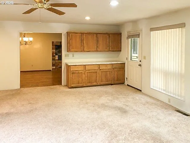 a view of a bathroom from the hallway