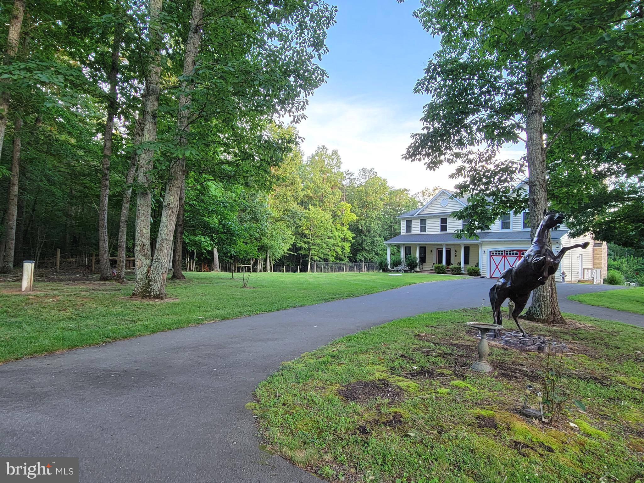 5.5 fully fenced acres with electronic gate entry