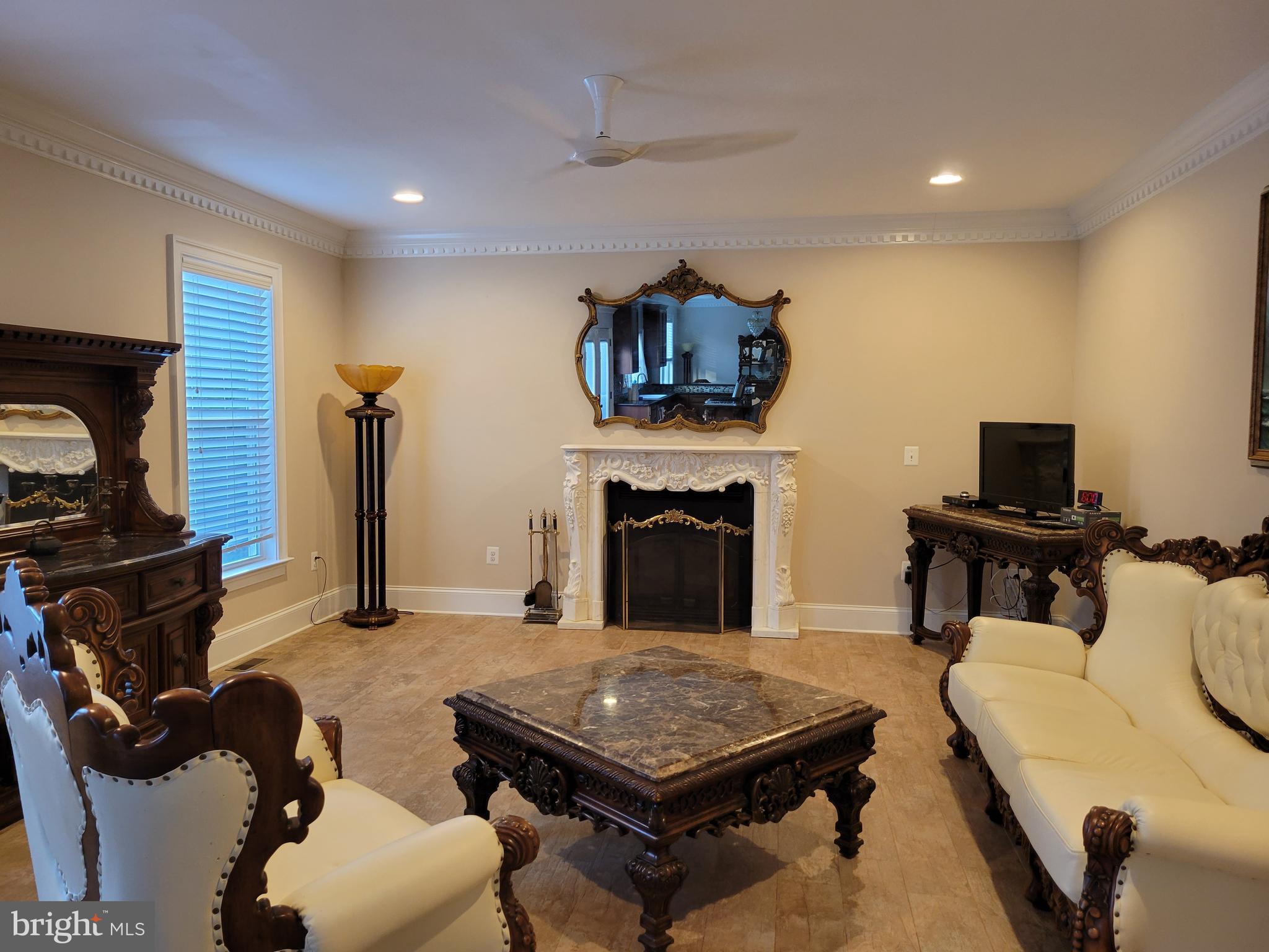 22354 Dragoon Road Lignum, VA 22726 - Photo 37 of 74 Crown molding, recessed lighting, unique fans!