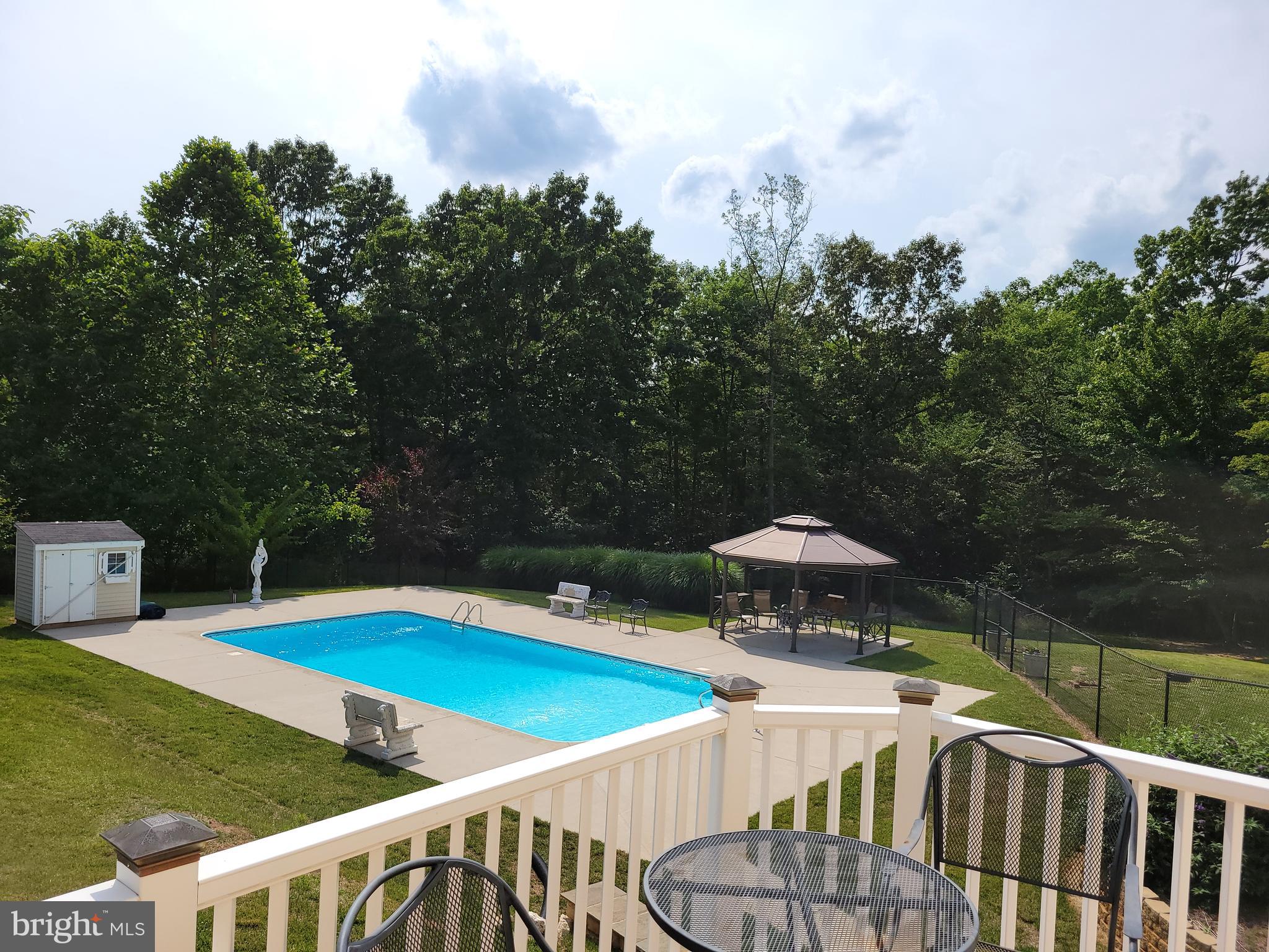22354 Dragoon Road Lignum, VA 22726 - Photo 63 of 74 Spacious back deck overlooking the pool!