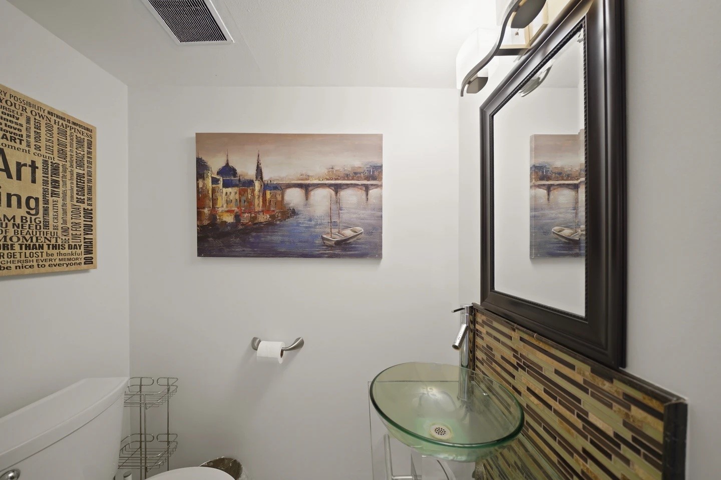 1235 Witte Road, Unit 8 Houston, TX 77055 - Photo 11 of 20 a bathroom with a toilet a sink and mirror