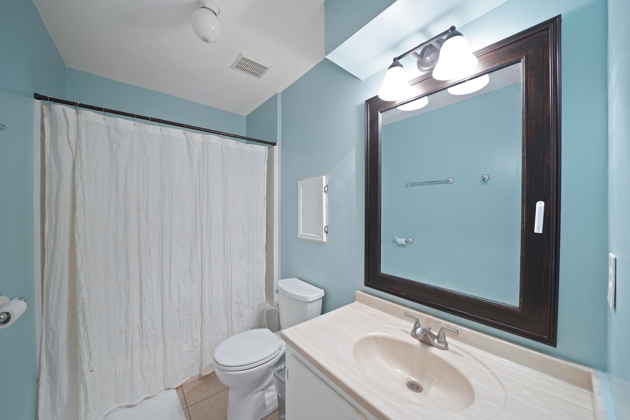 1235 Witte Road, Unit 8 Houston, TX 77055 - Photo 14 of 20 a bathroom with a sink toilet and shower