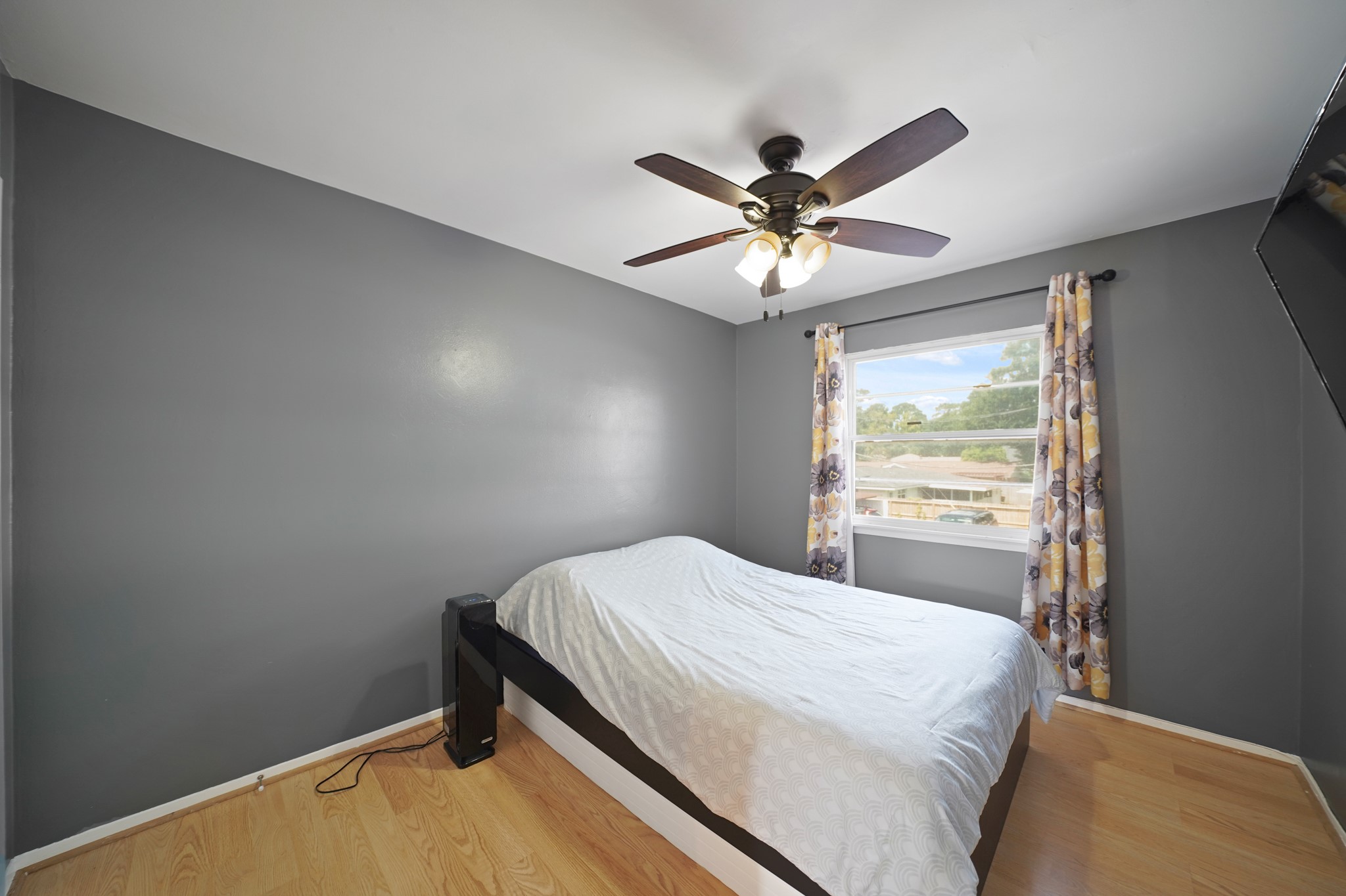 1235 Witte Road, Unit 8 Houston, TX 77055 - Photo 15 of 20 a bedroom with a bed and a window