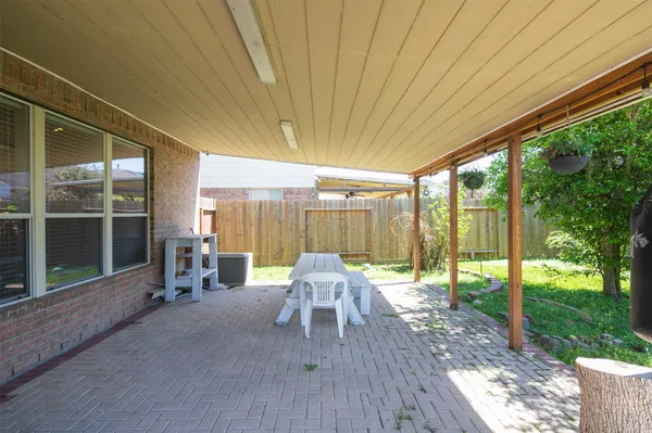 a house view with a seating space and garden view