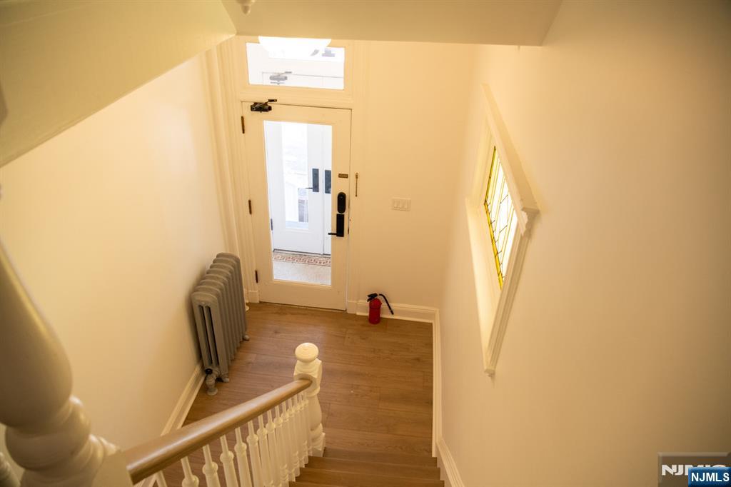 46 Garden Place, Unit 2 Edgewater, NJ 07020 - Photo 11 of 30 a view of a hallway with workspace
