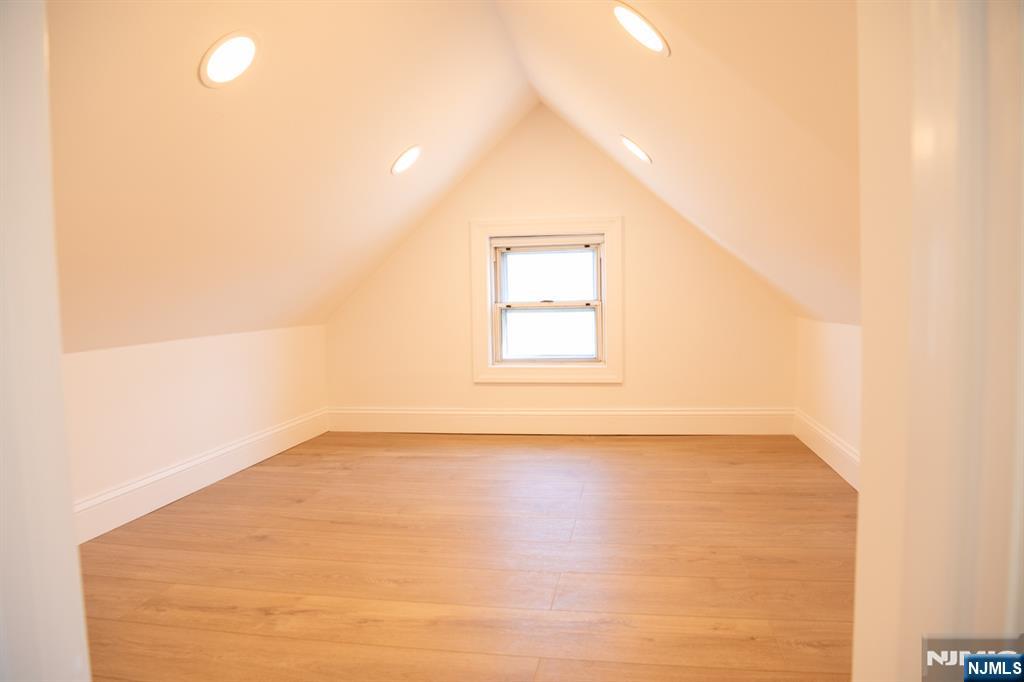 46 Garden Place, Unit 2 Edgewater, NJ 07020 - Photo 15 of 30 an empty room with windows
