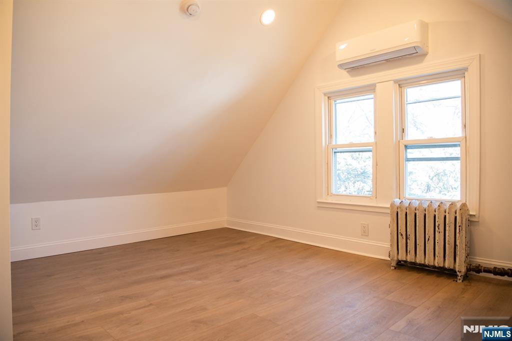46 Garden Place, Unit 2 Edgewater, NJ 07020 - Photo 16 of 30 an empty room with a window