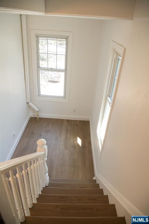 46 Garden Place, Unit 2 Edgewater, NJ 07020 - Photo 5 of 30 a view of entryway and hall with wooden floor