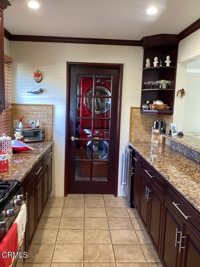 10444 Tujunga Canyon Boulevard Tujunga, CA 91042 - Photo 3 of 10 a kitchen with stainless steel appliances granite countertop a refrigerator and a sink