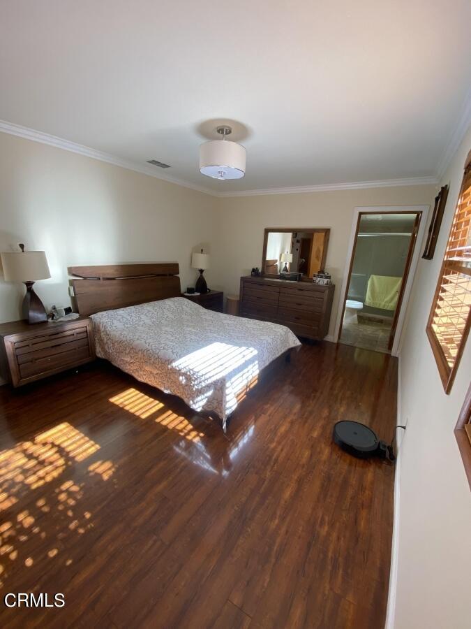 10444 Tujunga Canyon Boulevard Tujunga, CA 91042 - Photo 4 of 10 a living room with furniture and a flat screen tv