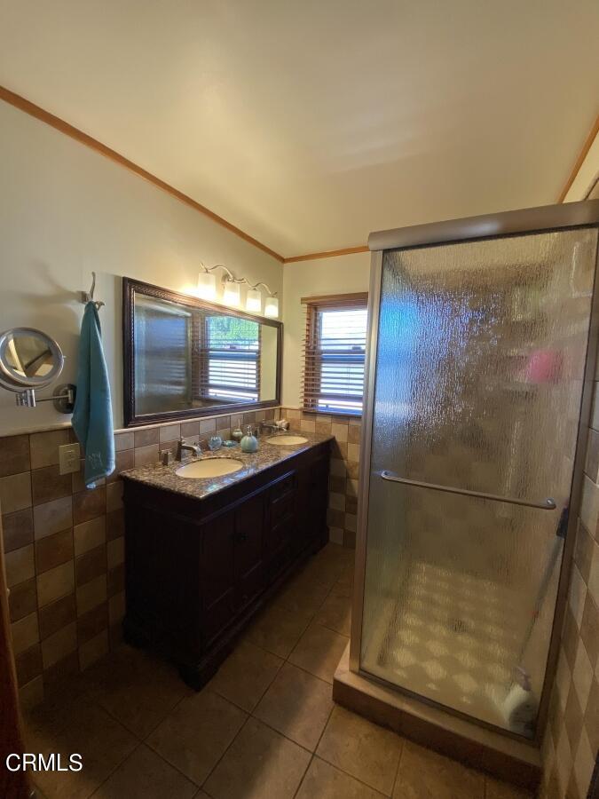 10444 Tujunga Canyon Boulevard Tujunga, CA 91042 - Photo 7 of 10 a view of kitchen with sink window and refrigerator