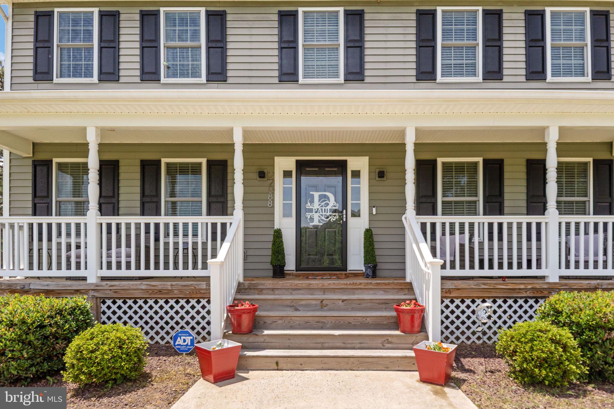 22088 Landora Bridge Road Ruther Glen, VA 22546 - Photo 19 of 122 Charming porch with inviting entryway.