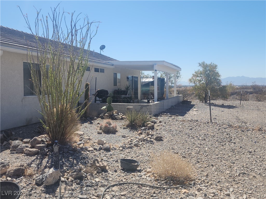 2311 West Mae Road Pahrump, NV 89060 - Photo 14 of 24 View of yard with a patio