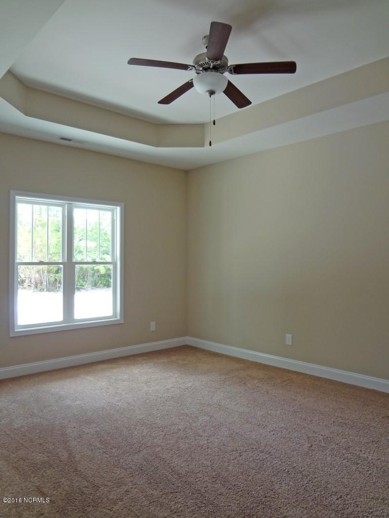 281 Folkstone Road Holly Ridge, NC 28445 - Photo 11 of 26 Master Bedroom 1