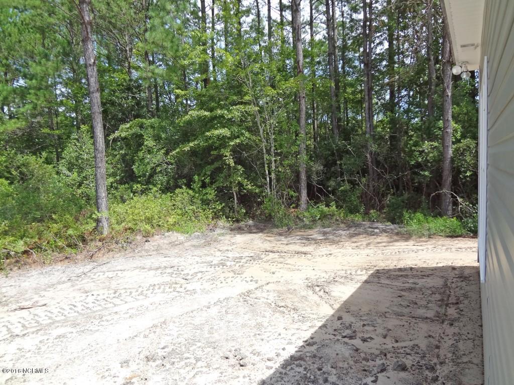 281 Folkstone Road Holly Ridge, NC 28445 - Photo 25 of 26 Back Yard