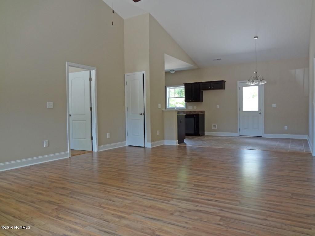 281 Folkstone Road Holly Ridge, NC 28445 - Photo 3 of 26 Living Room 2