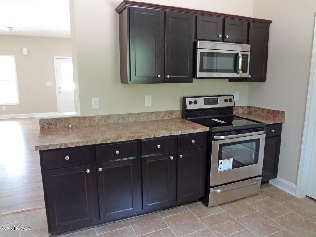 281 Folkstone Road Holly Ridge, NC 28445 - Photo 5 of 26 Kitchen 1