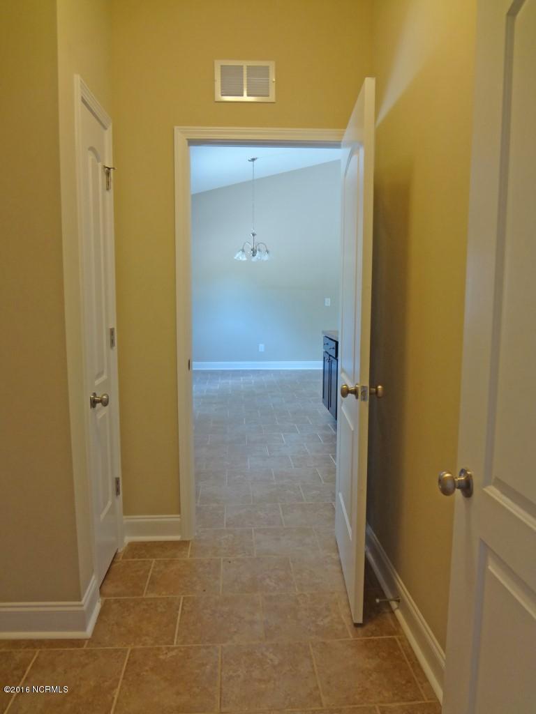 281 Folkstone Road Holly Ridge, NC 28445 - Photo 8 of 26 Garage to Kitchen