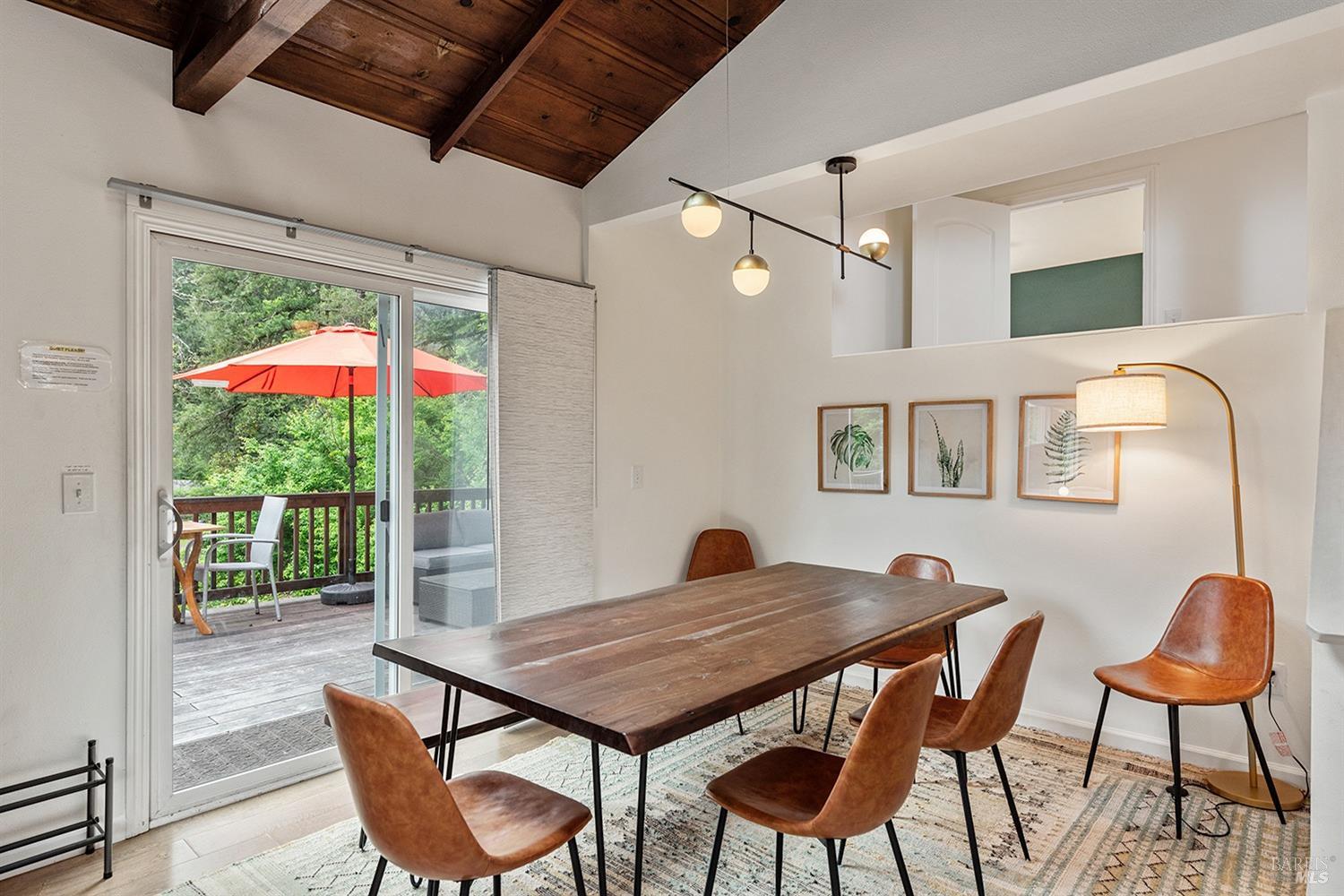 10680 Old River Road Forestville, CA 95436 - Photo 15 of 37 a view of a dining room with furniture and a chandelier