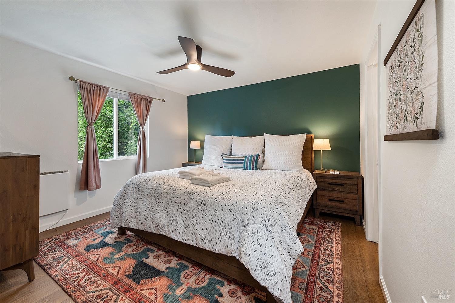 10680 Old River Road Forestville, CA 95436 - Photo 19 of 37 a bedroom with a bed and a window