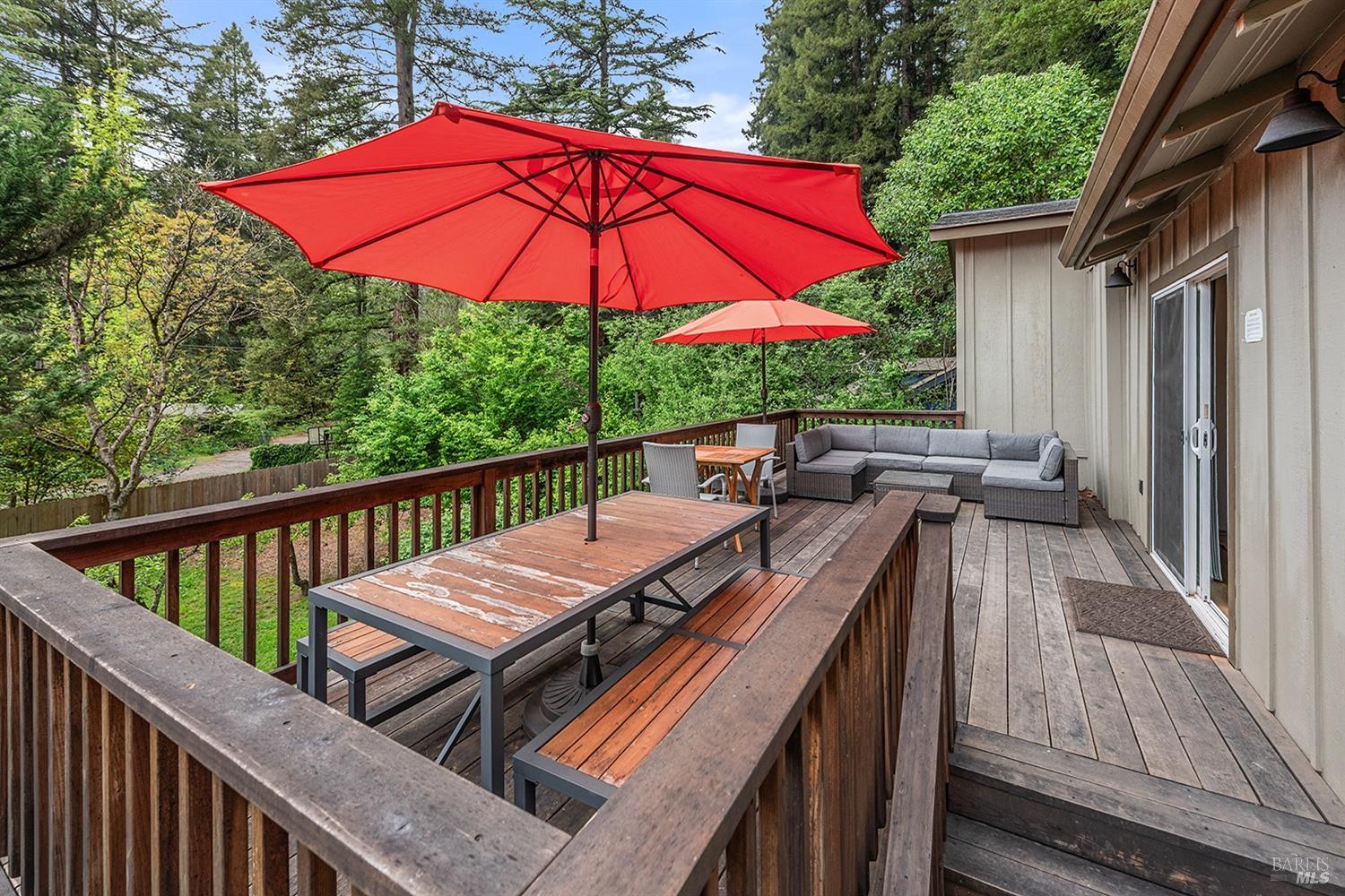 10680 Old River Road Forestville, CA 95436 - Photo 29 of 37 a view of a balcony with chairs and wooden deck
