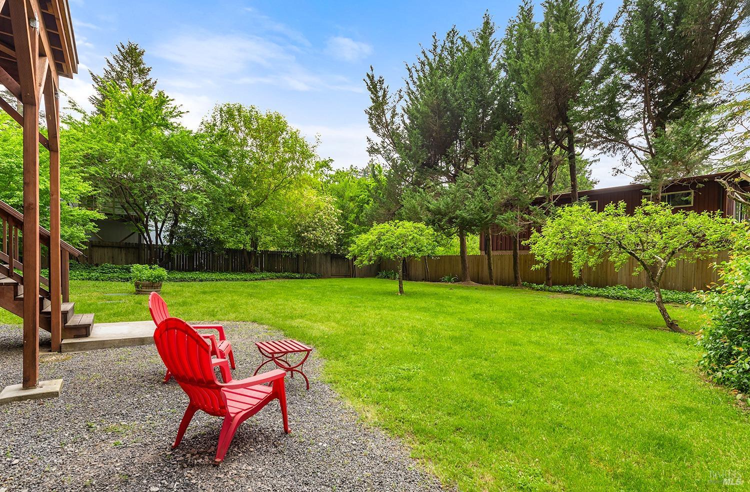 10680 Old River Road Forestville, CA 95436 - Photo 30 of 37 a view of a table and chairs in the garden