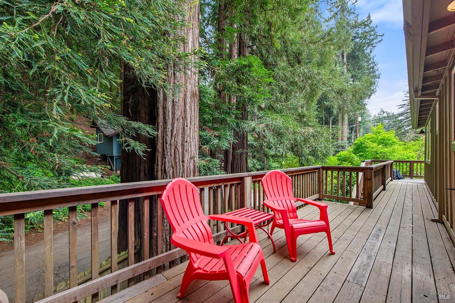10680 Old River Road Forestville, CA 95436 - Photo 6 of 37 a view of a wooden chairs on the deck