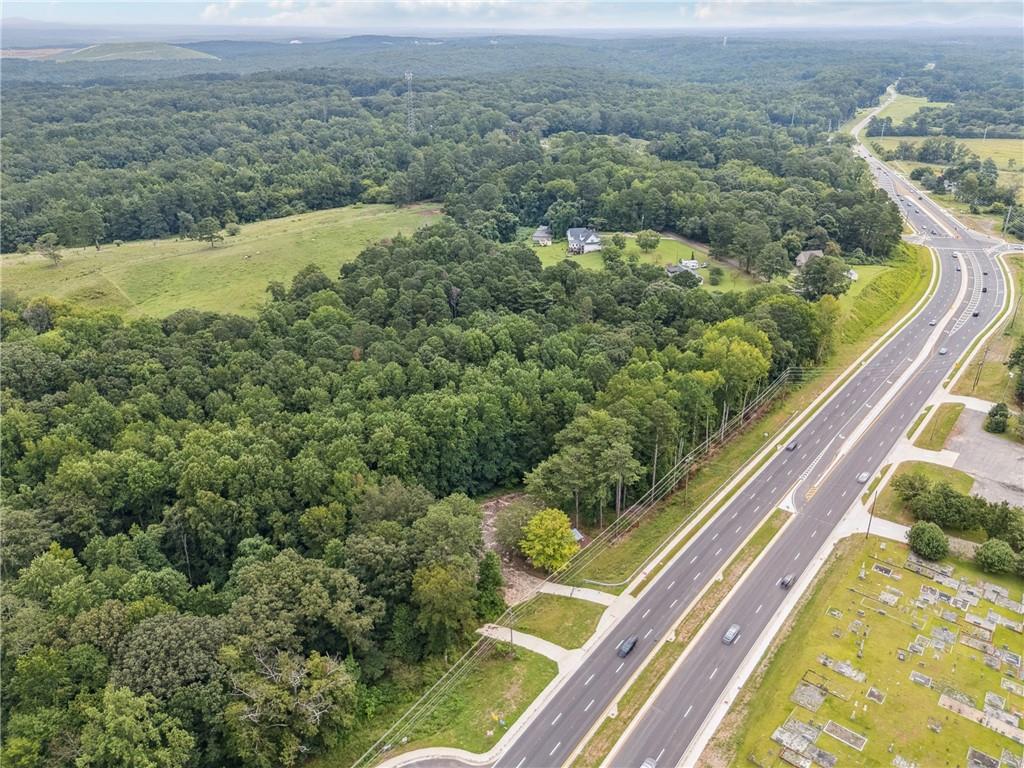 4527 Cumming Highway Canton, GA 30115 - Photo 5 of 8 a view of a forest from a balcony